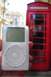 An iPod in Birmingham at a telephone box.